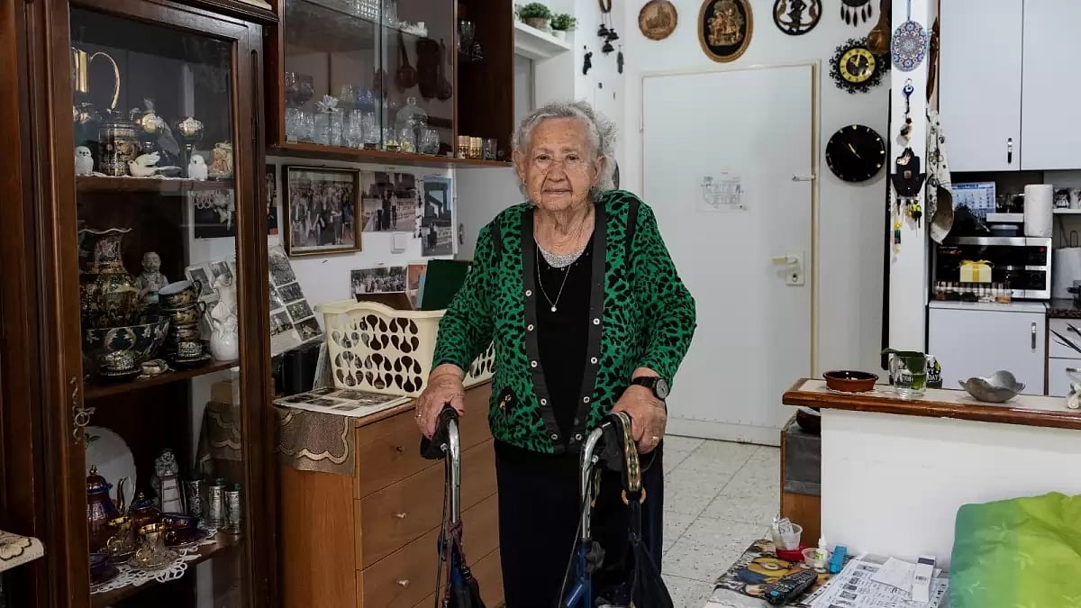Holocaust survivor Tova Gutstein, 90, who lived in the Warsaw Ghetto as a child, poses for a photo at her apartment in the city of Rishon Lezion, Israel, Sunday, April 9, 2023.