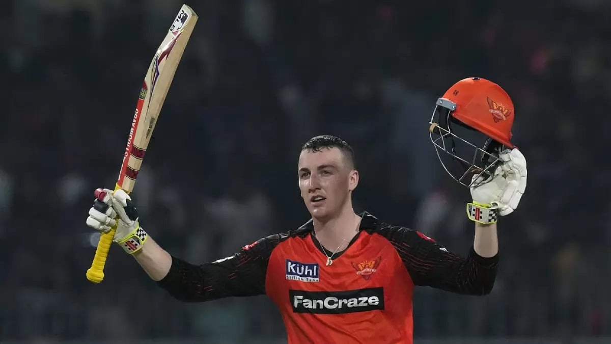 Harry Brook raises his bat after scoring a blistering 55-ball 100 against KKR.