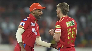 Sam Curran, right, had led PBKS against LSG in Dhawan's absence, winning the match by 2 wickets.