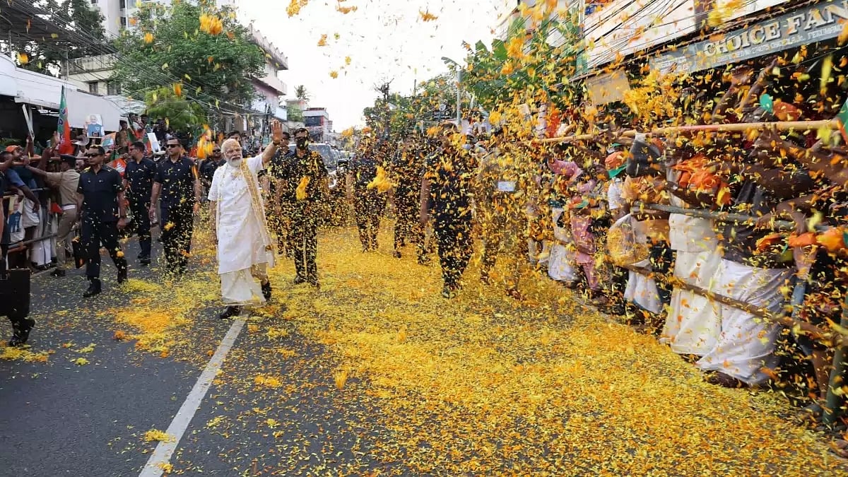 PM Modi during a roadshow in Kochi on Monday
