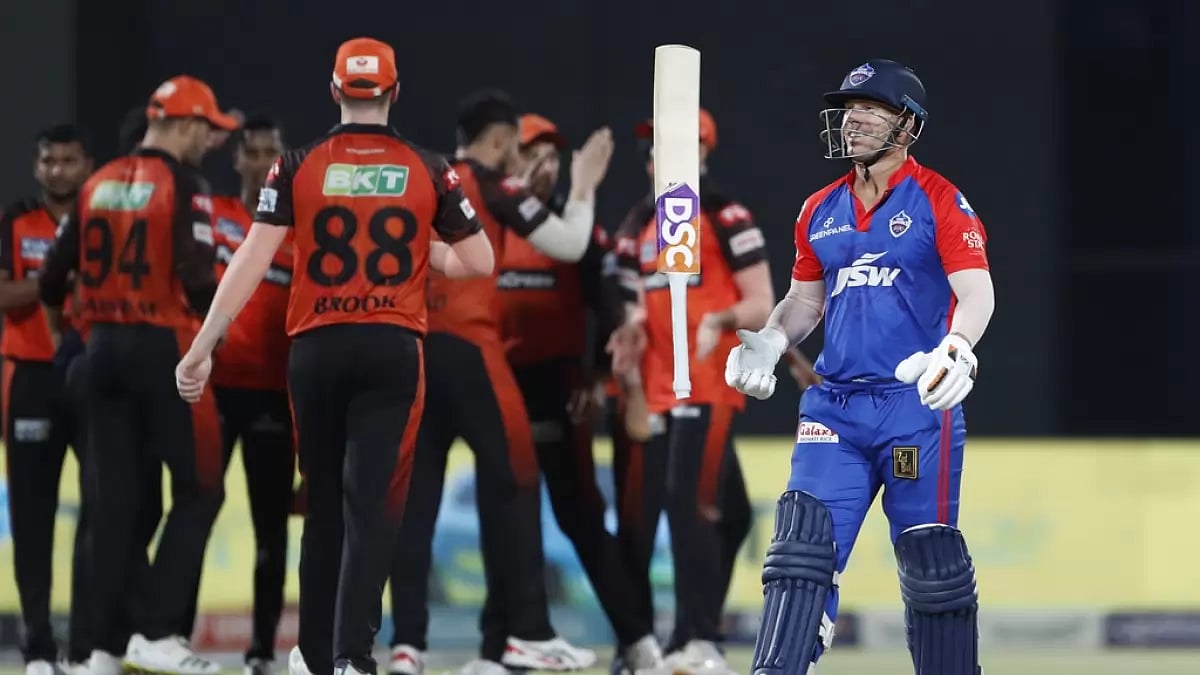 SRH players celebrate the wicket of David Warner in Delhi on Saturday.