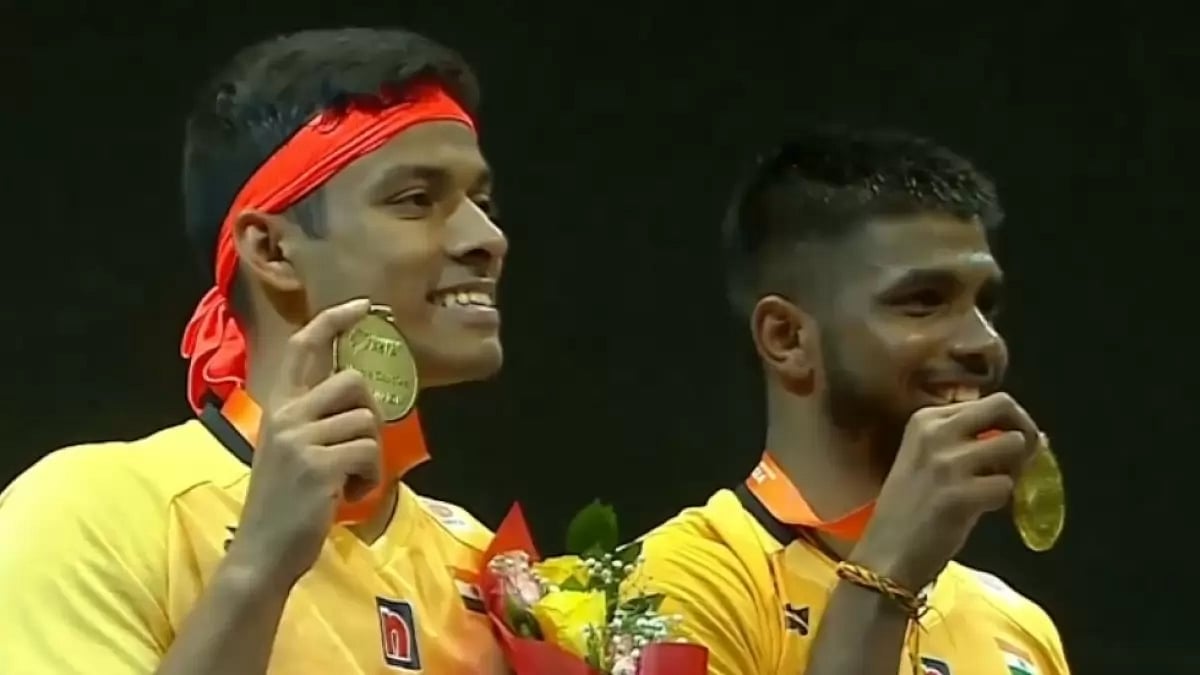 Chirag Shetty, left, and Satwiksairaj display their gold medals in Dubai on Sunday.