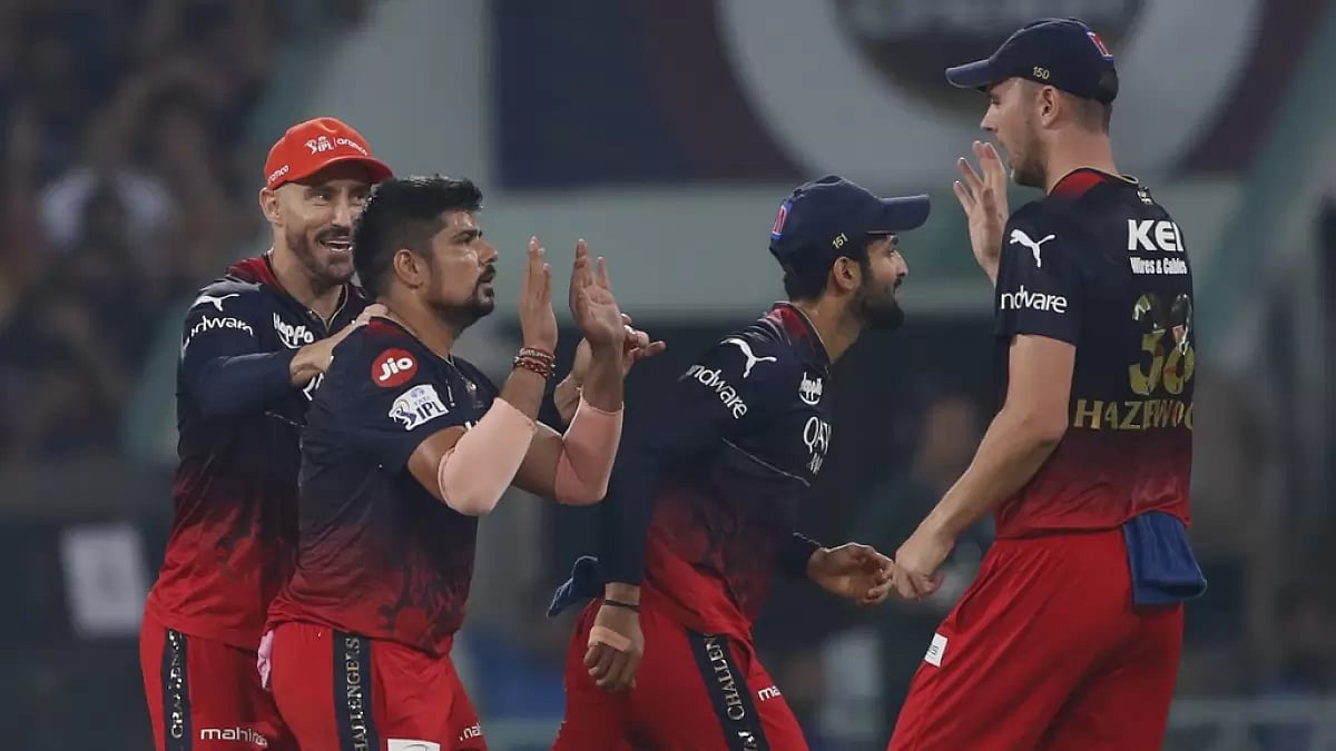 RCB players celebrate the wicket of Nicholas Pooran in Lucknow on Monday.