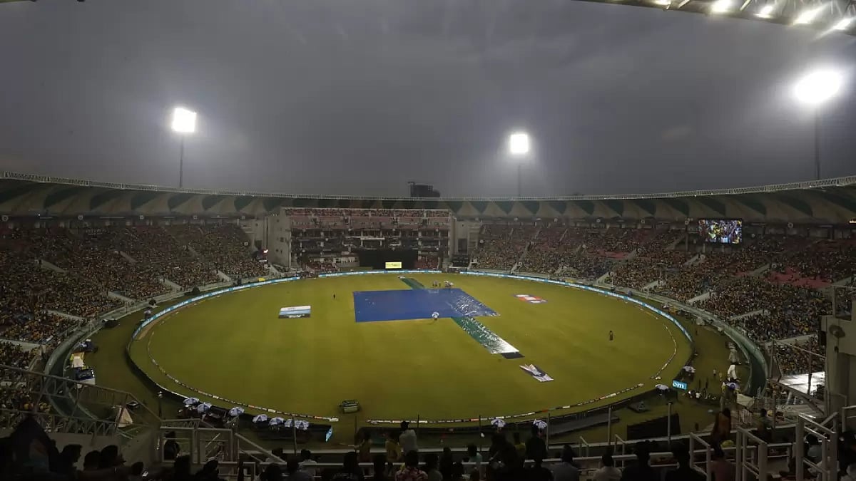 The pitch area is covered in sheets after rain stopped play in Lucknow on Wednesday.