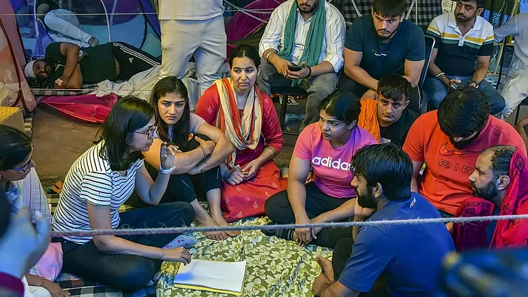 Wrestlers have been sitting on a protest in the national capital since April 23. - null