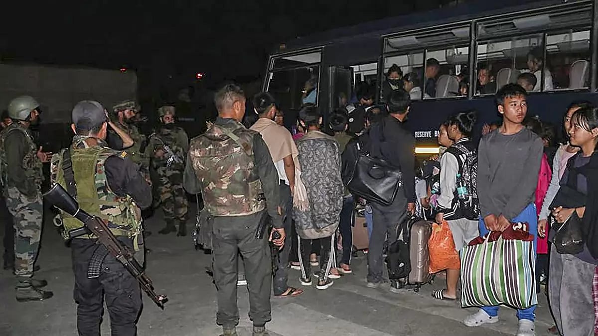 Indian Army and Assam Rifles personnel rescue civilians from violence-hit areas in Manipur.