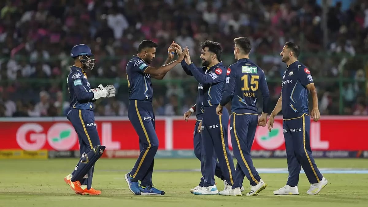 GT players celebrate the wicket of Ravichandran Ashwin in Jaipur on Friday.