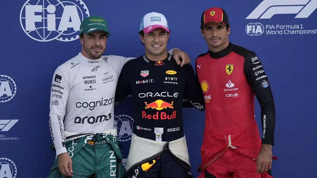 Perez, centre, with second and third-place qualifying finishers Alonso and Sainz Jr on Saturday.