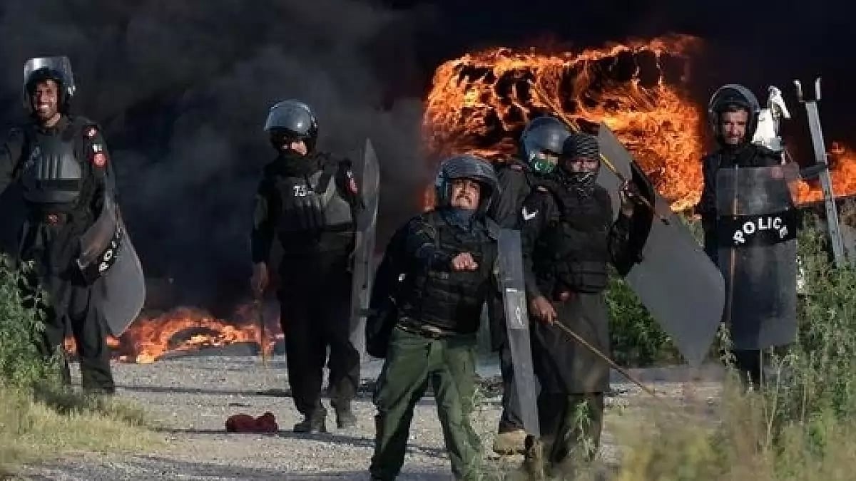 Police pelting stones at supporters of Imran Khan in Pakistan on May 10