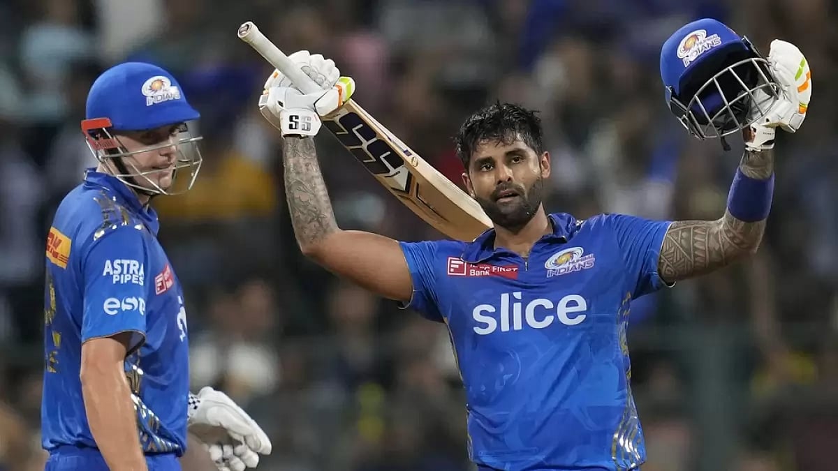 Suryakumar Yadav celebrates after reaching his hundred against GT in Mumbai on Friday.