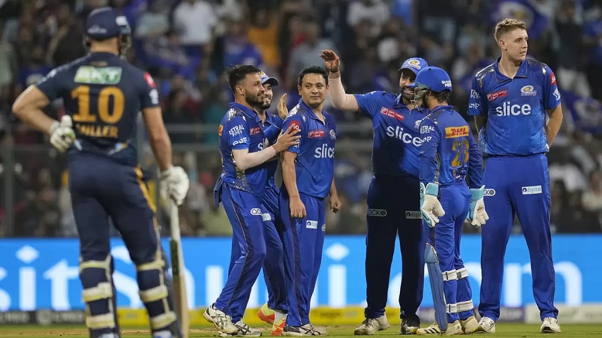 MI players celebrate the wicket of Vijay Shankar in Mumbai on Friday.