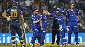 MI players celebrate the wicket of Vijay Shankar in Mumbai on Friday.
