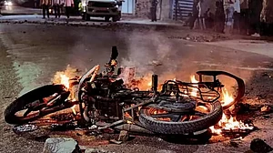 Two-wheeler set on fire as violence erupts in Maharashtra's Akola