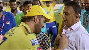 Dhoni pictured signing Gavaskar's shirt after Sunday's match against KKR.