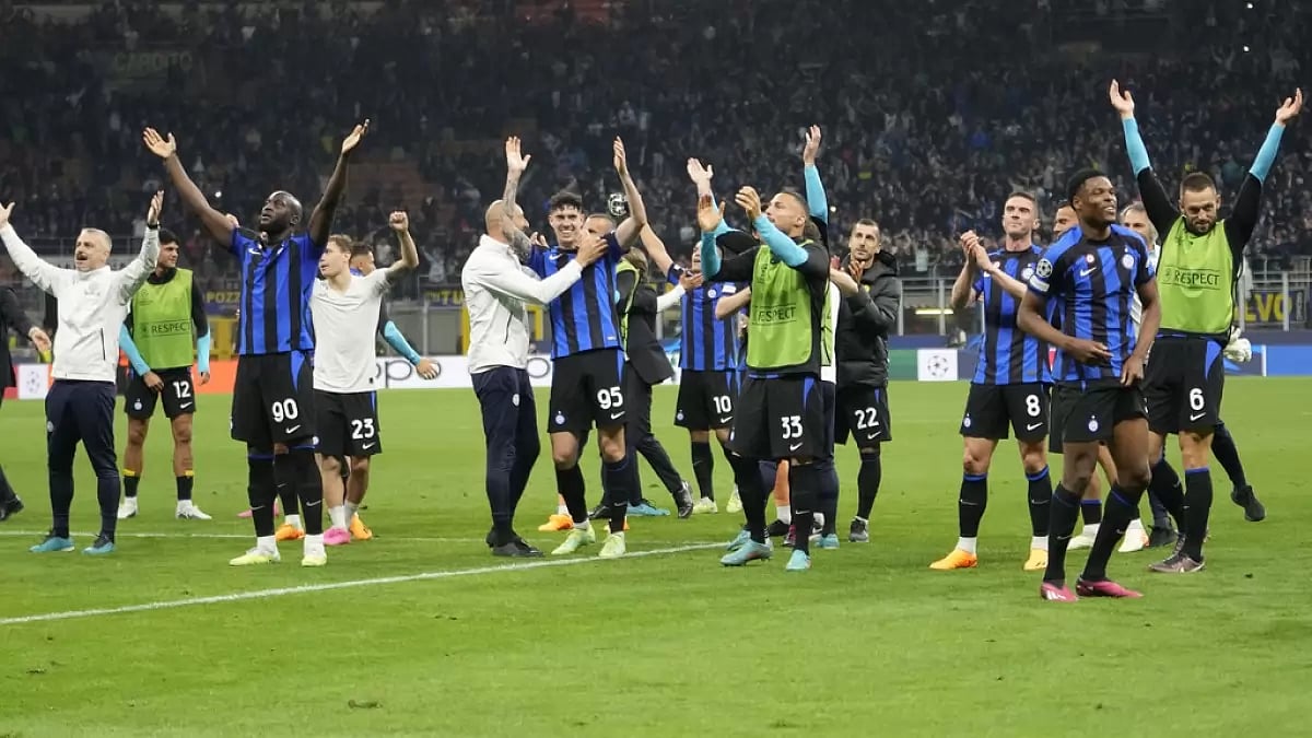 Inter Milan players celebrate their win against AC Milan on Tuesday.