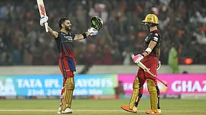 Kohli, left, celebrates after reaching his hundred against SRH in Hyderabad on Thursday.