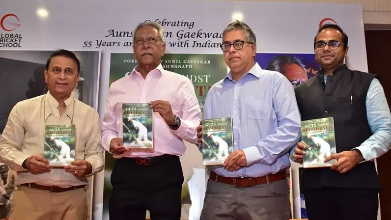 Gavaskar, left, and Gaekwad, second left, at the unveiling of the latter's autobiography. - null