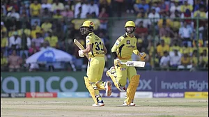 Gaikwad, left, and Conway in action during their 141-run partnership against DC on Saturday.
