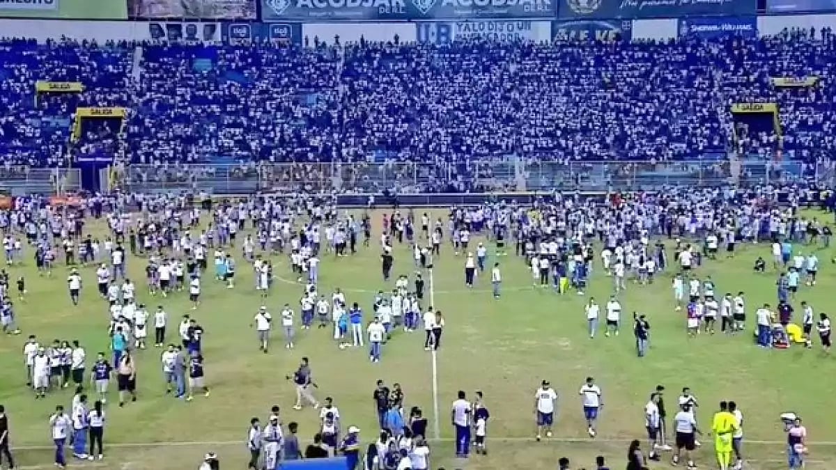 With the crowd spilling onto the pitch, the game was abandoned after just 15 minutes.