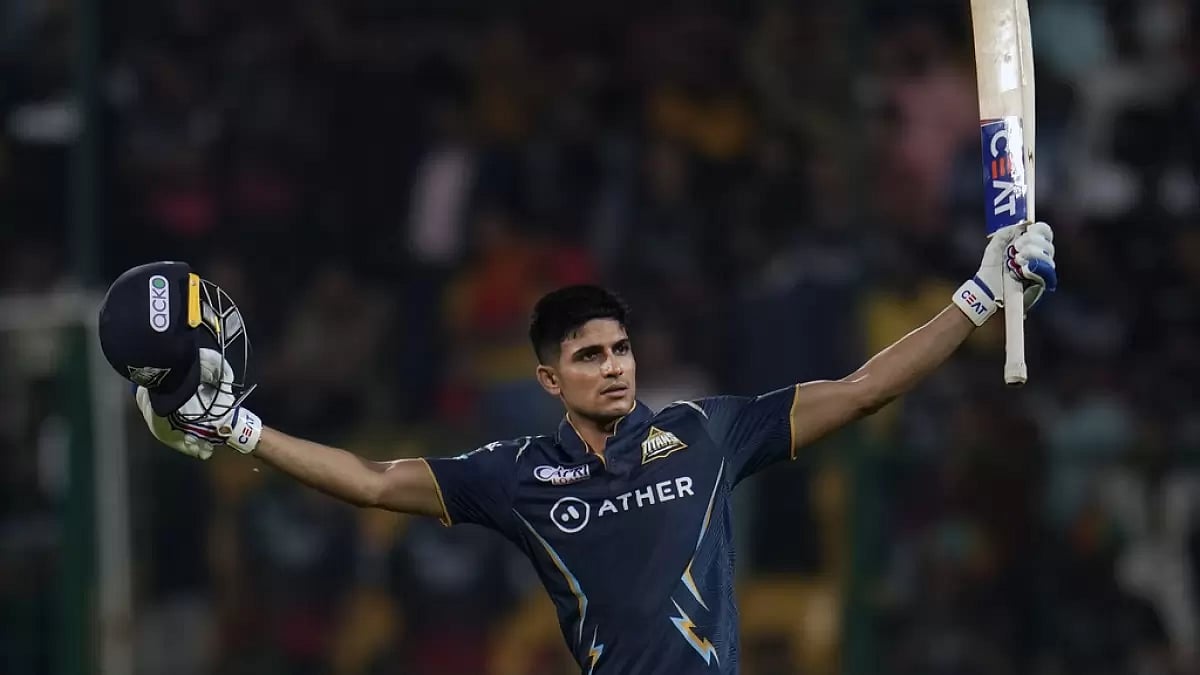 Gill celebrates after reaching his hundred against RCB in Bengaluru on Sunday.