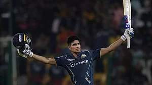 Gill celebrates after reaching his hundred against RCB in Bengaluru on Sunday.