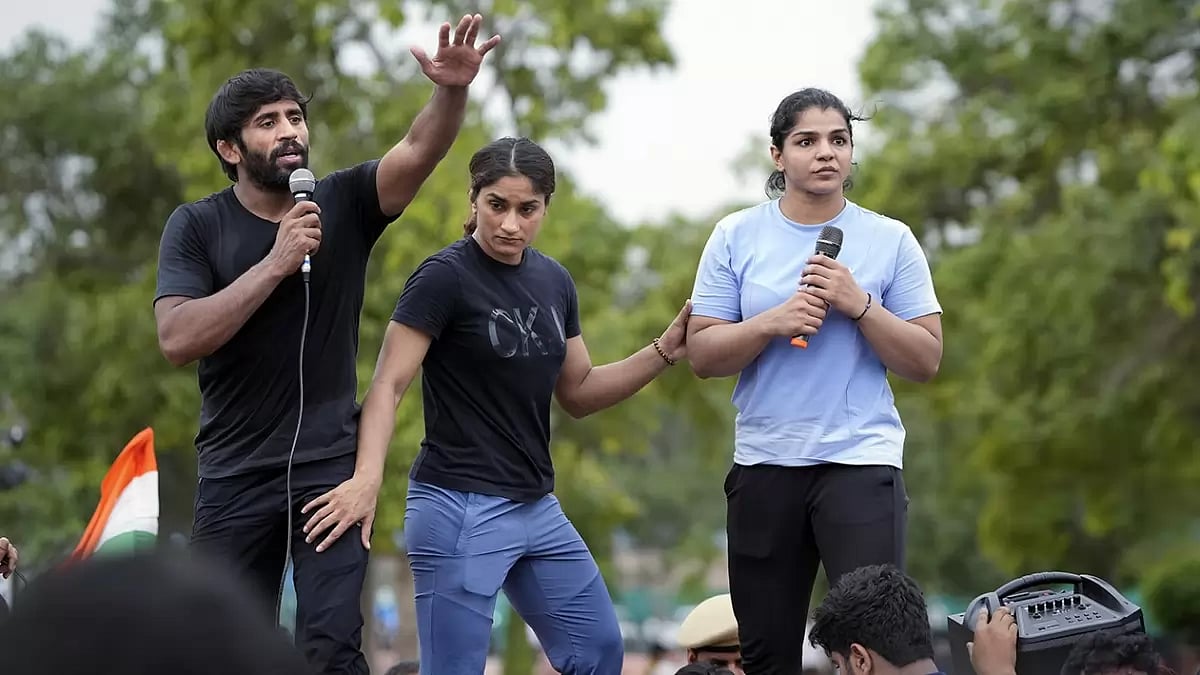 Wrestlers candle march protest