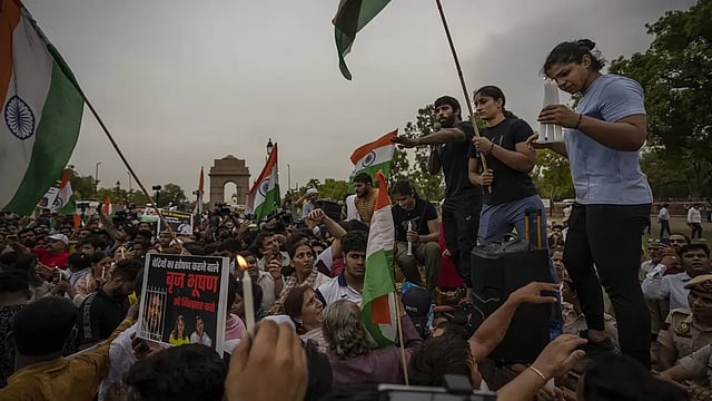 Protesting Wrestlers Hold Candlelight March Against WFI Chief At India Gate - In Pics