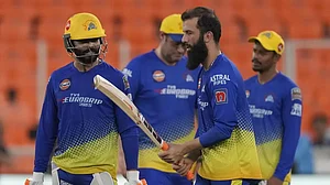 Moeen Ali and Ravindra Jadeja of CSK interact during a team training session on Saturday.