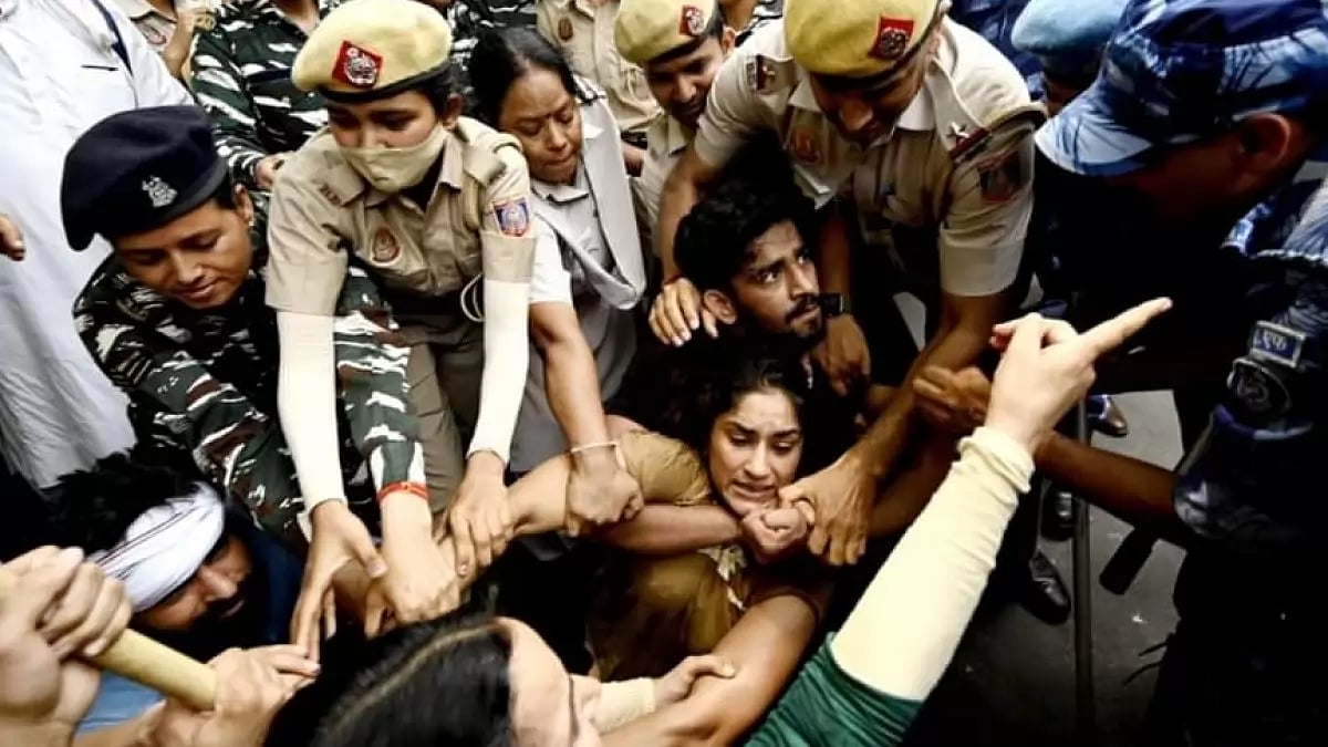 Protesting wrestlers being detained by Delhi Police.