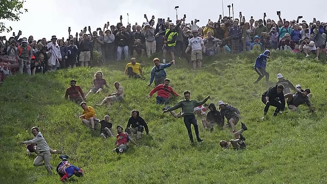Gloucestershire: People Participating In Cooper's Cheese Rolling And Wake