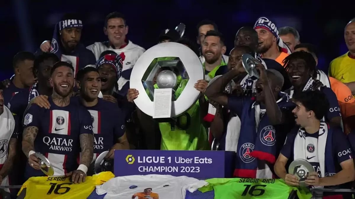 PSG players celebrate their title on the final day of the Ligue 1 season.