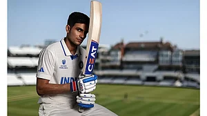 Shubman Gill poses in India's Test shirt
