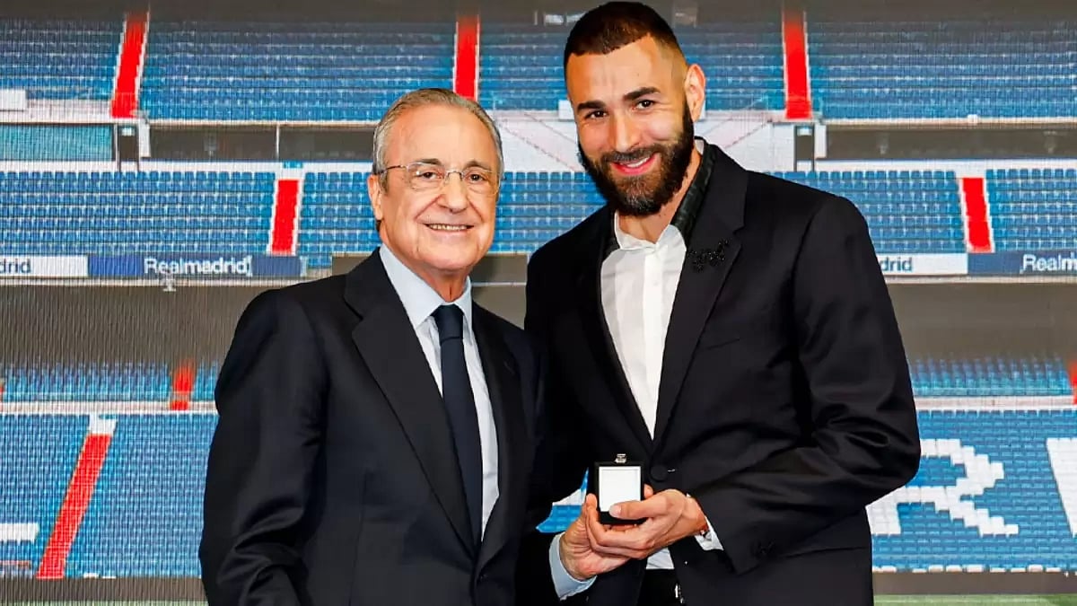 Club president Florentino Perez with Karim Benzema at the ceremony.