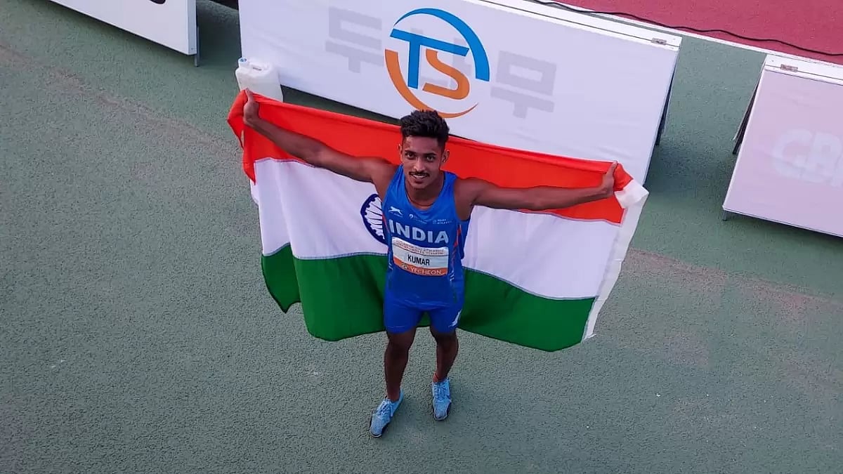 Sunil Kumar celebrates his gold win on Tuesday.