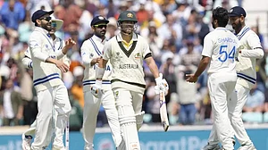 Shardul Thakur, right, celebrates the wicket of David Warner in London on Wednesday.