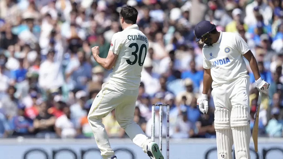 Pat Cummins celebrates after dismissing Rohit Sharma in London on Thursday.