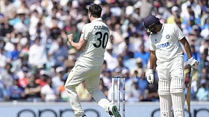 Pat Cummins celebrates after dismissing Rohit Sharma in London on Thursday.
