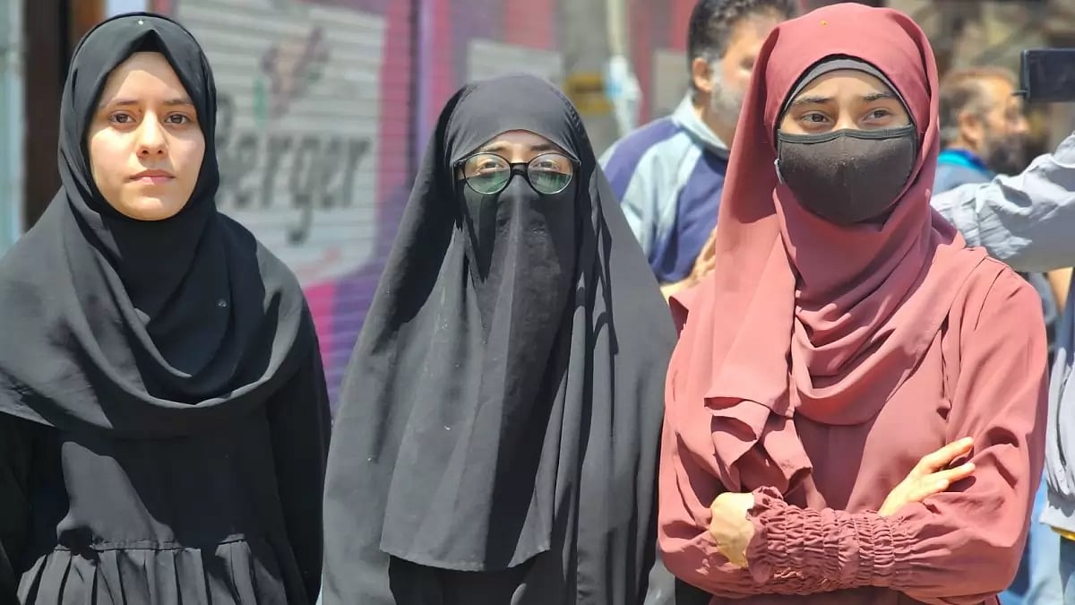 Female students protesting at Srinagar against the alleged ban on wearing abaya in school