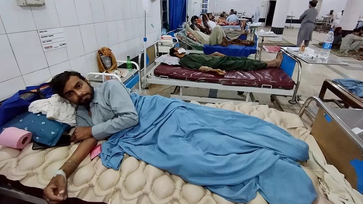 Injured victims of rain storm are treated at a hospital in Bannu in Pakistan's Khyber Pakhtunkhwa province. 