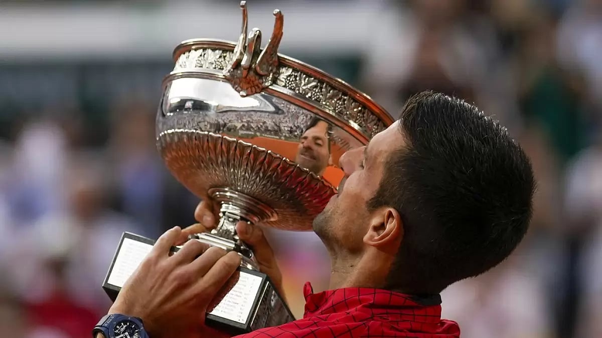 Djokovic celebrates his record-breaking 23rd Grand Slam win in Paris on Sunday.