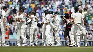 Members of Australia and India teams shake hands after the conclusion of the WTC Final on Sunday.