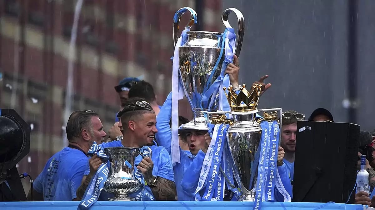 Manchester City Celebrates Treble Of Major Trophies With Open Top Bus manchester-city-celebrates-treble-of-major-trophies-with-open-top-bus