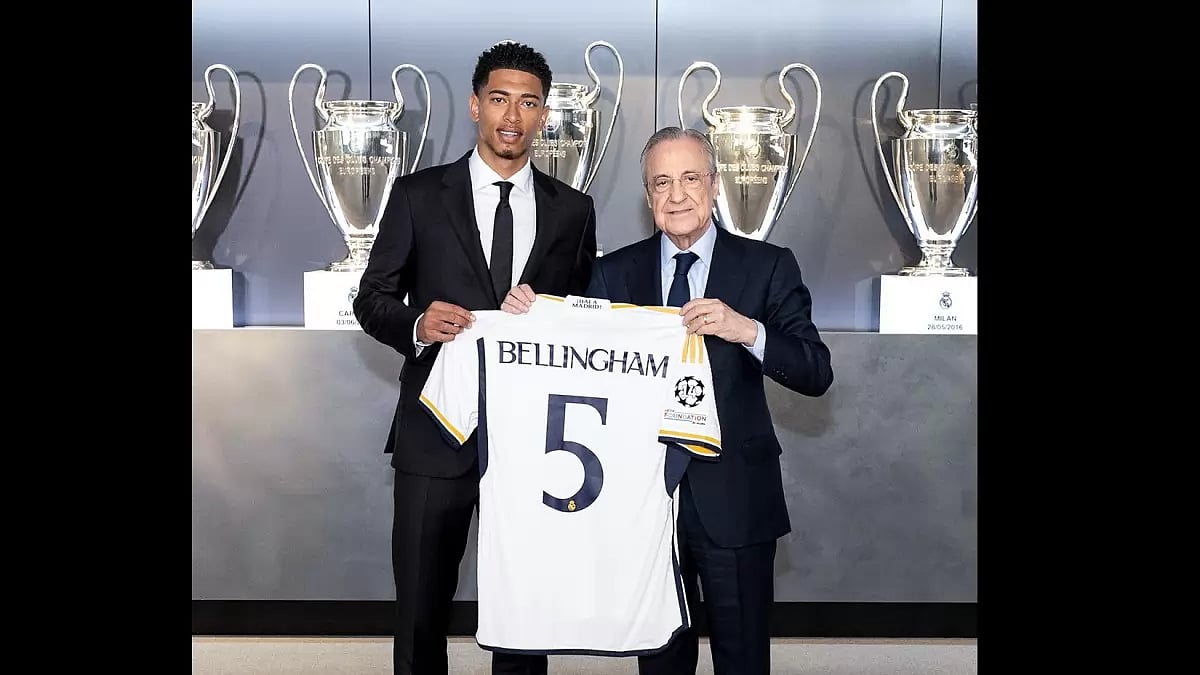 Bellingham pictured with Real Madrid president Florentino Perez.