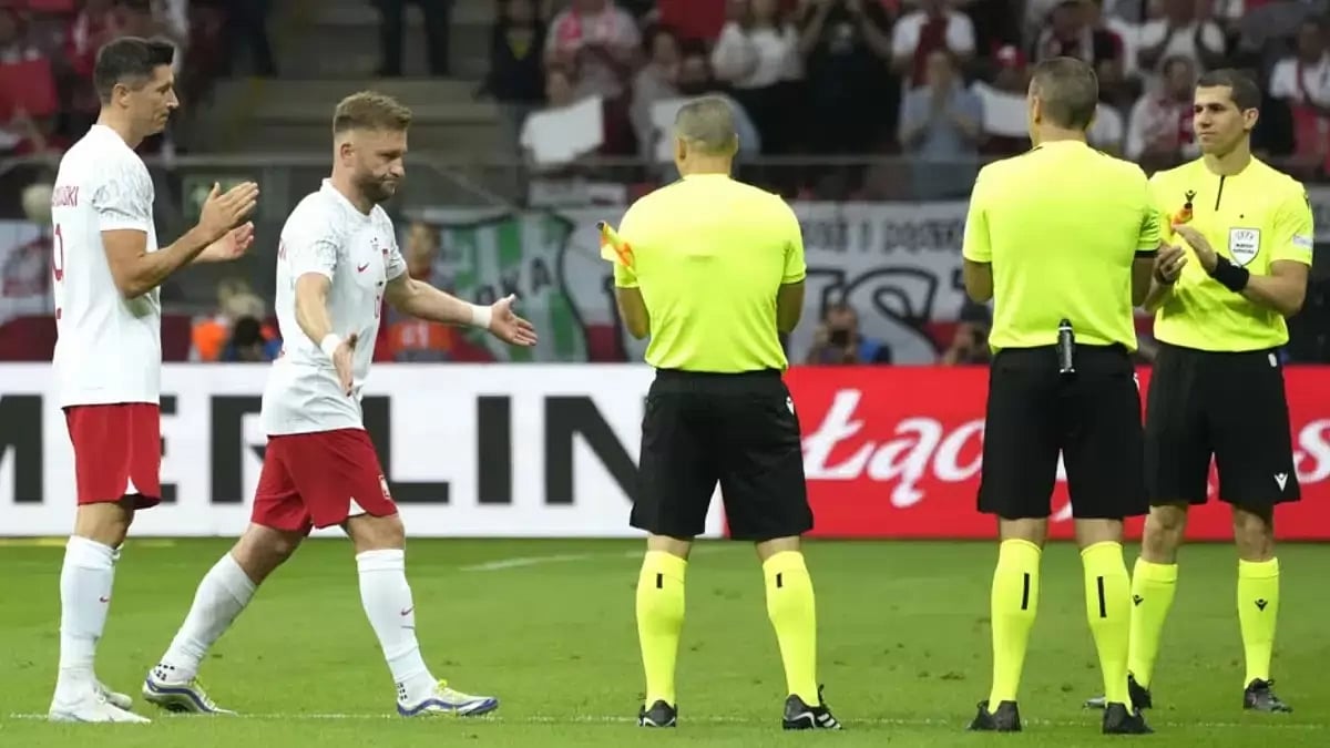 Poland's Jakub Blaszczykowski (SL) walks off in what was his last international appearance.