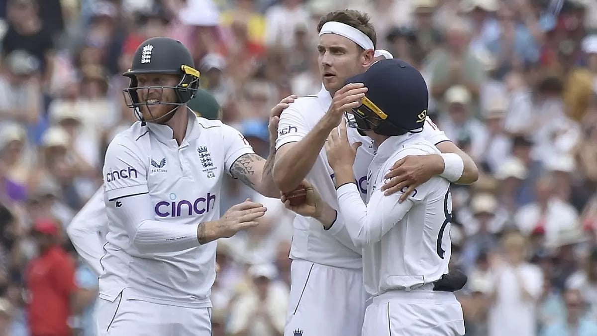 Broad, centre, celebrates the wicket of Australia's Scott Boland on Sunday.