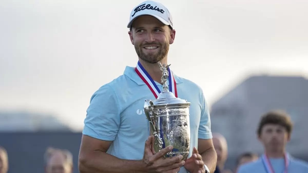 Wyndham Clark holds the holds the trophy after winning the U.S. Open golf tournamenT.