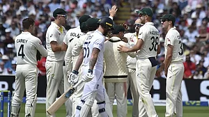 Australia players celebrate the wicket of Jonny Bairstow on Monday.