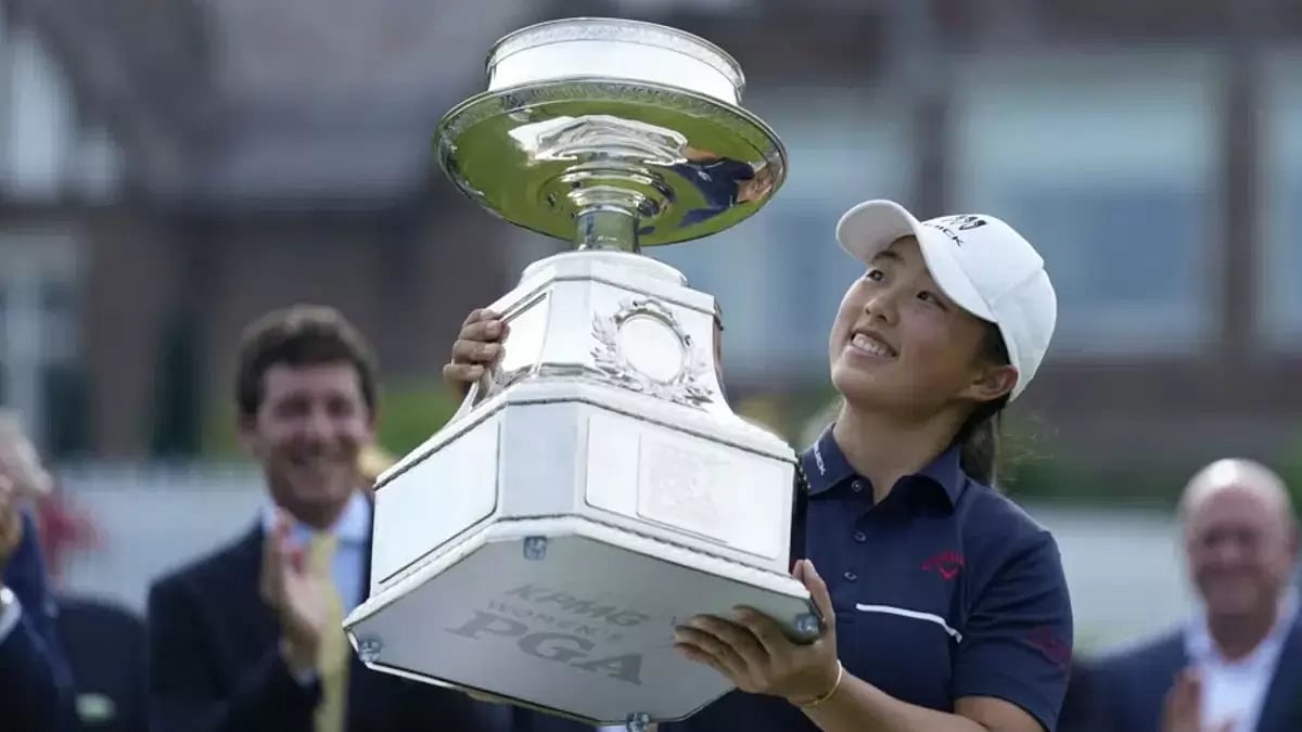 Ruoning Yin holds the trophy after winning the Women's PGA Championship.