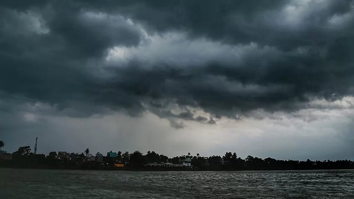 Dark monsoon clouds hover the River Hooghly