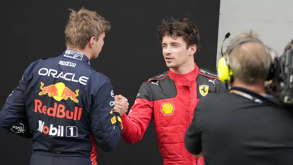 Verstappen, left, is congratulated by Leclerc after clocking the fastest time in Qualifying.